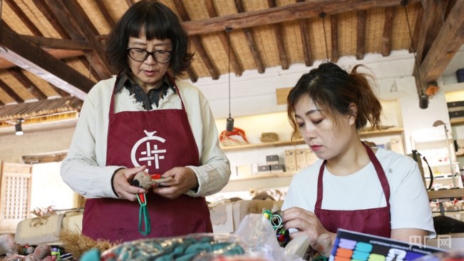 世界杯史上首次：中国非遗麻编“踢”进美加墨 第 2 张